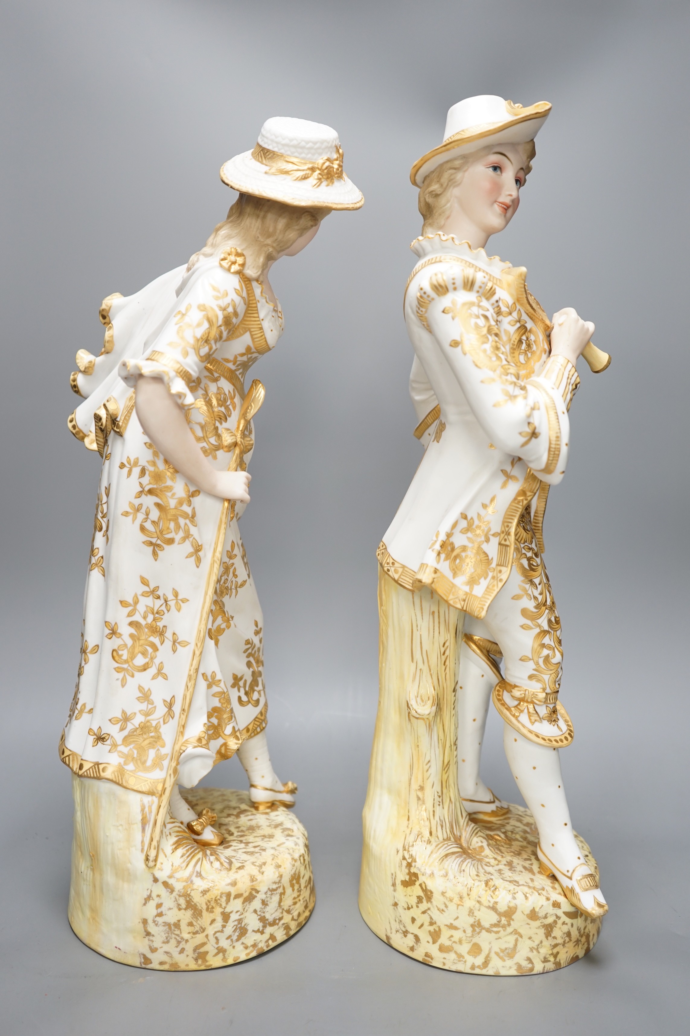 A pair of late 19th century Paris porcelain figures, tallest 50cm